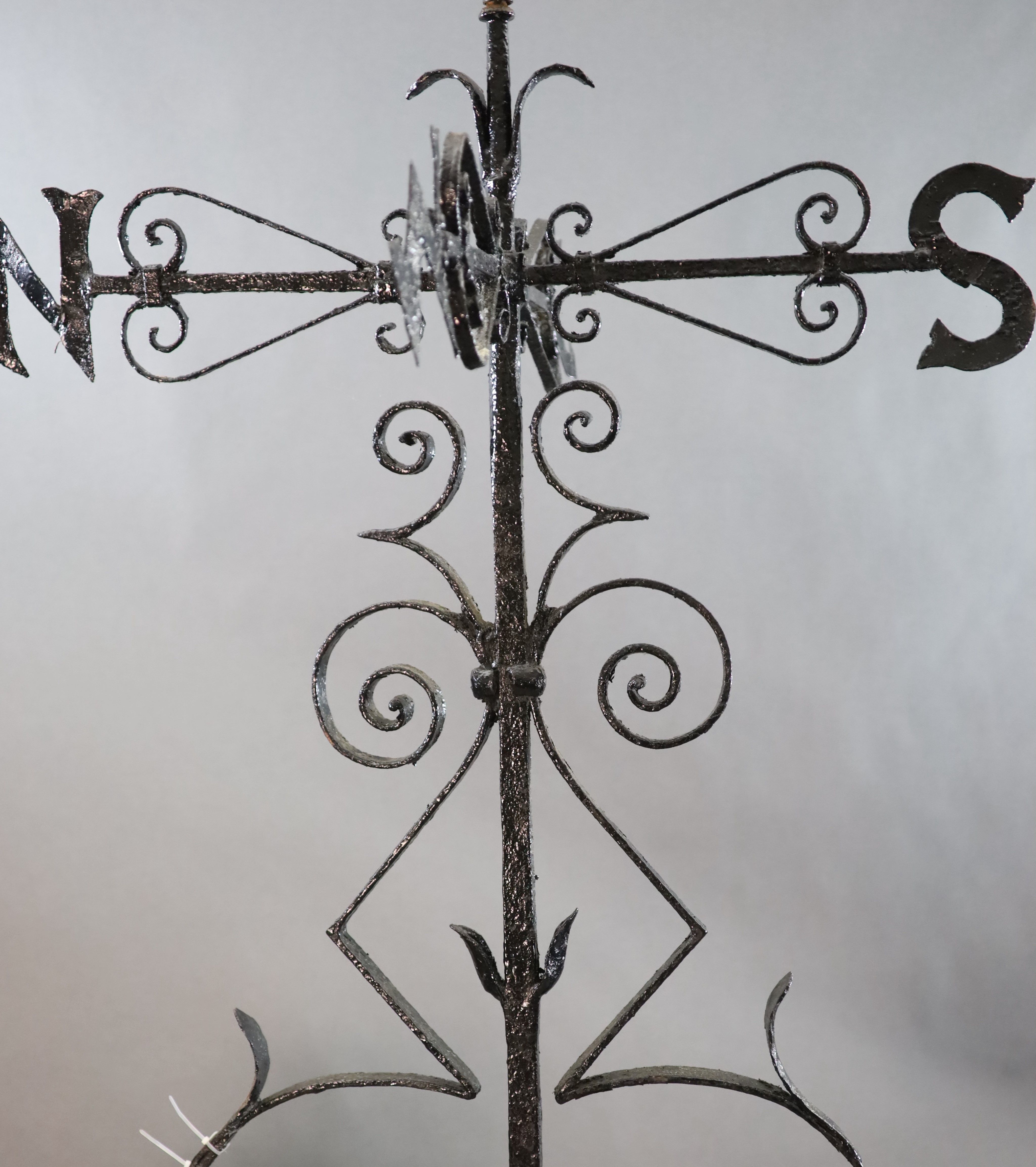 A large Victorian black painted wrought iron weather vane, H.8ft 4in.